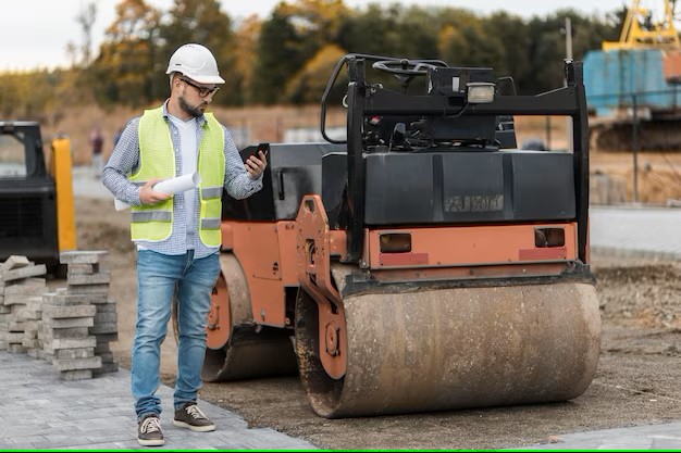 A man standing at road construction